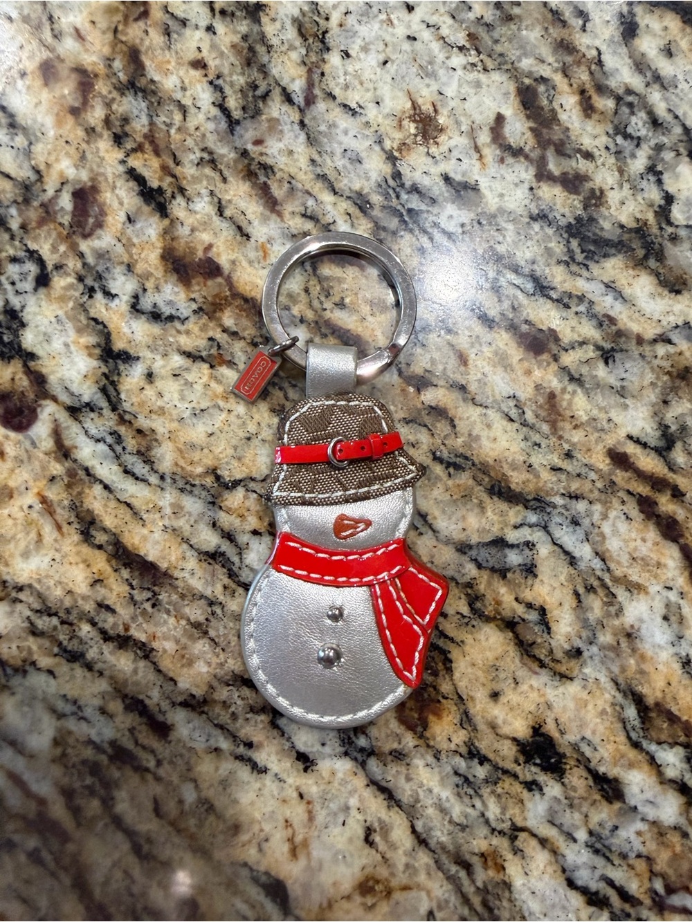 Coach Red-Accented Silver Snowman Keychain